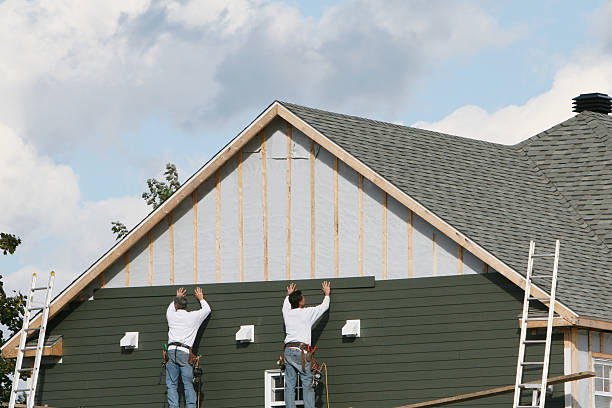 Professional Siding technician working in Lakewood, NY